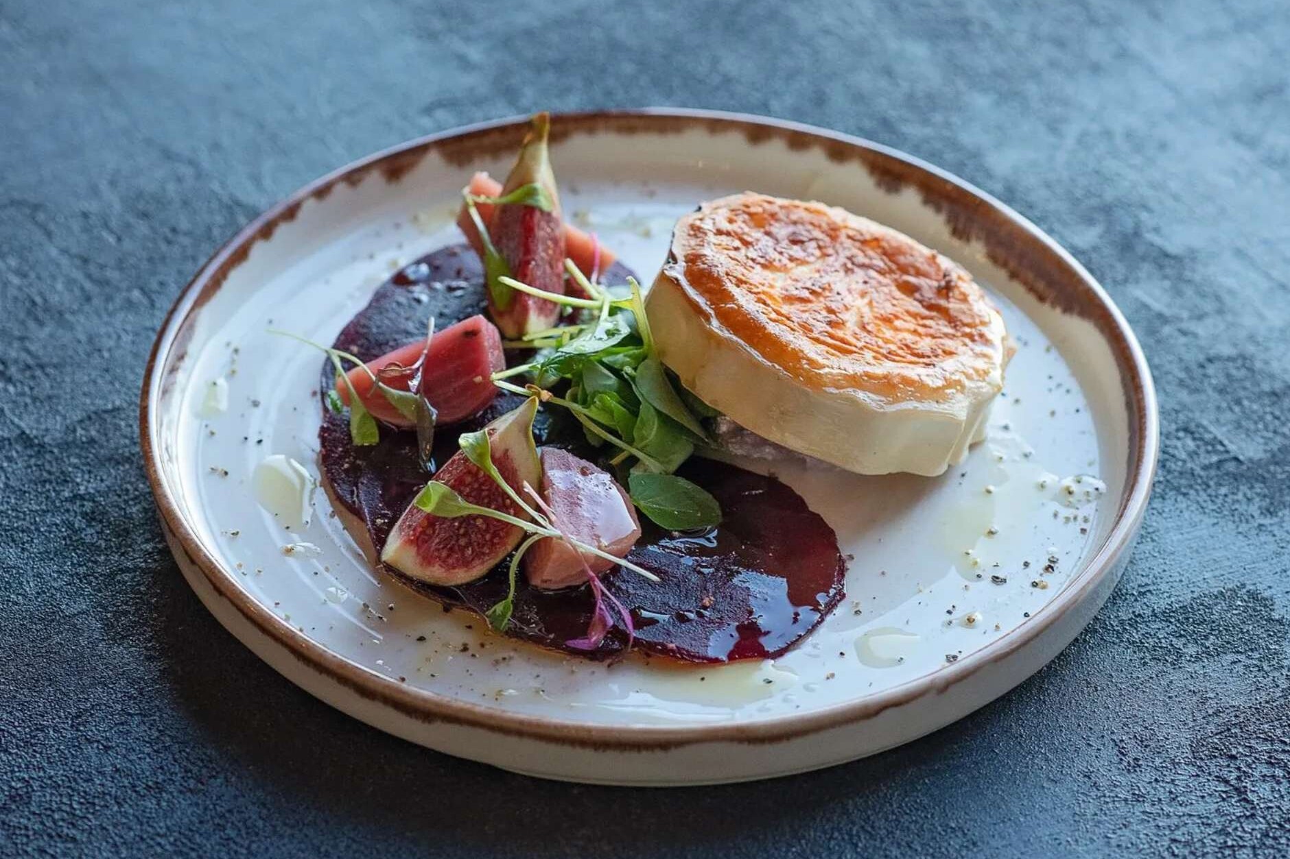 Beautifully presented starter dish with fig side garnish from Fairways Brasserie Angus.