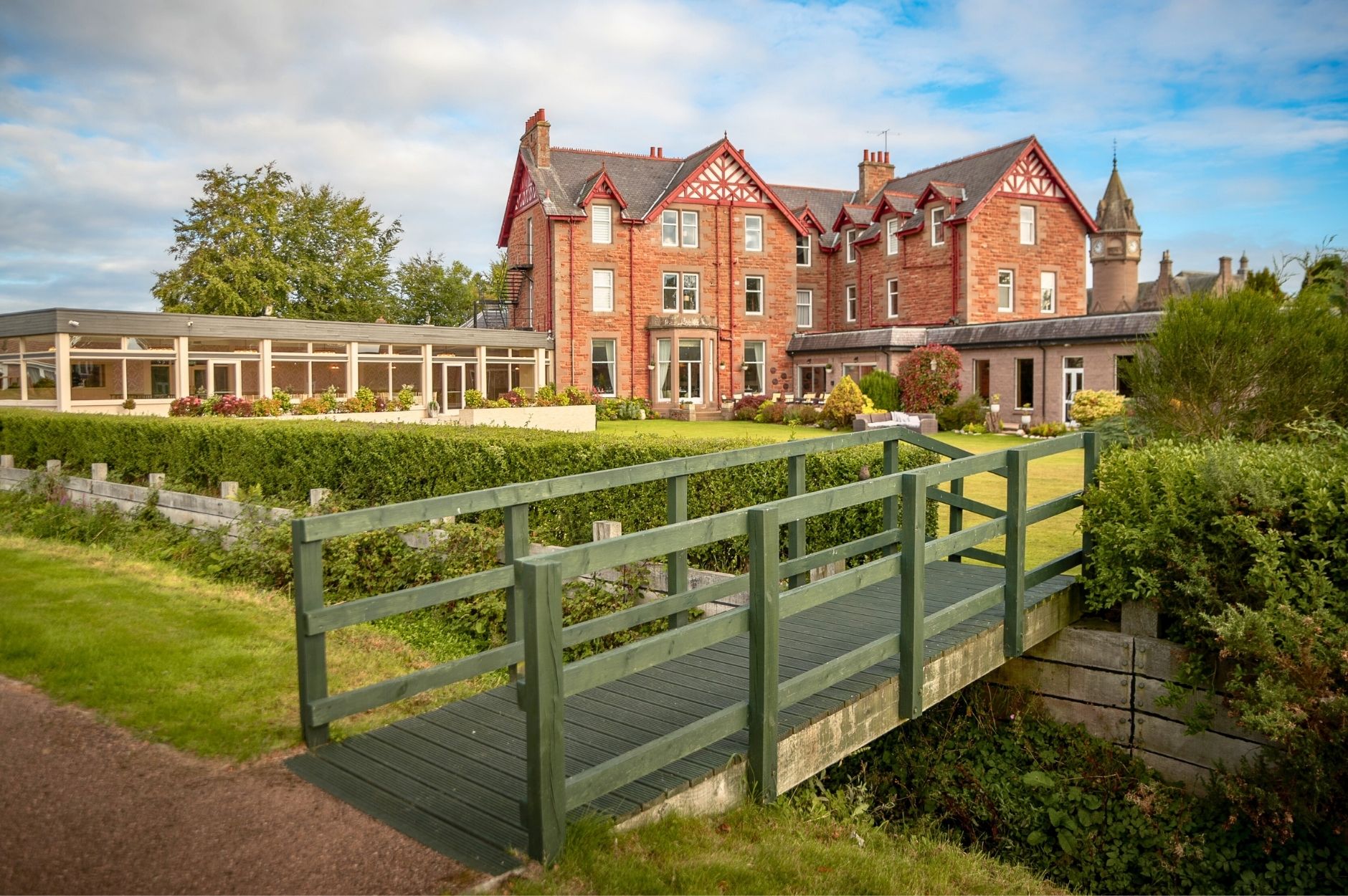 Outdoor back garden view from bridge at the Glenesk Hotel Angus