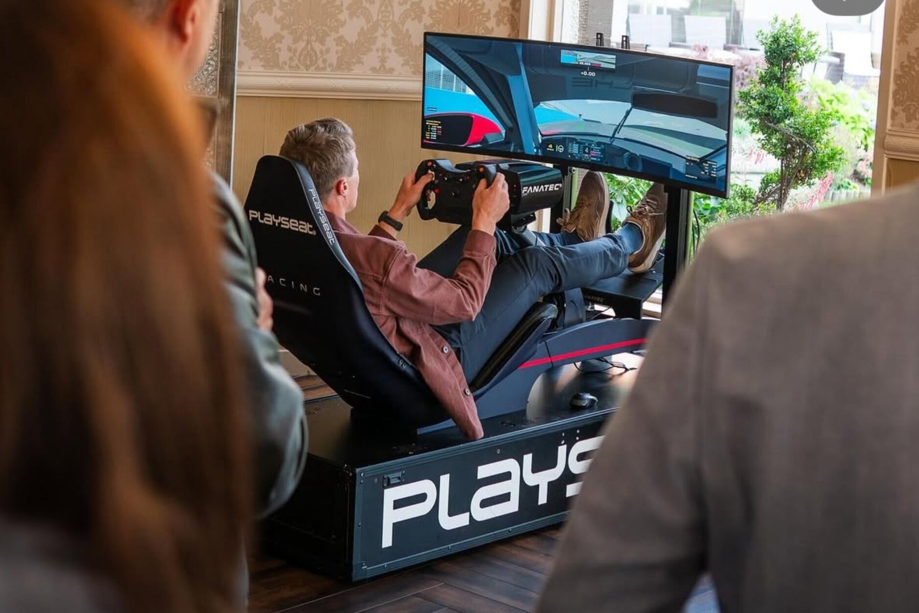 Man playing a racing game