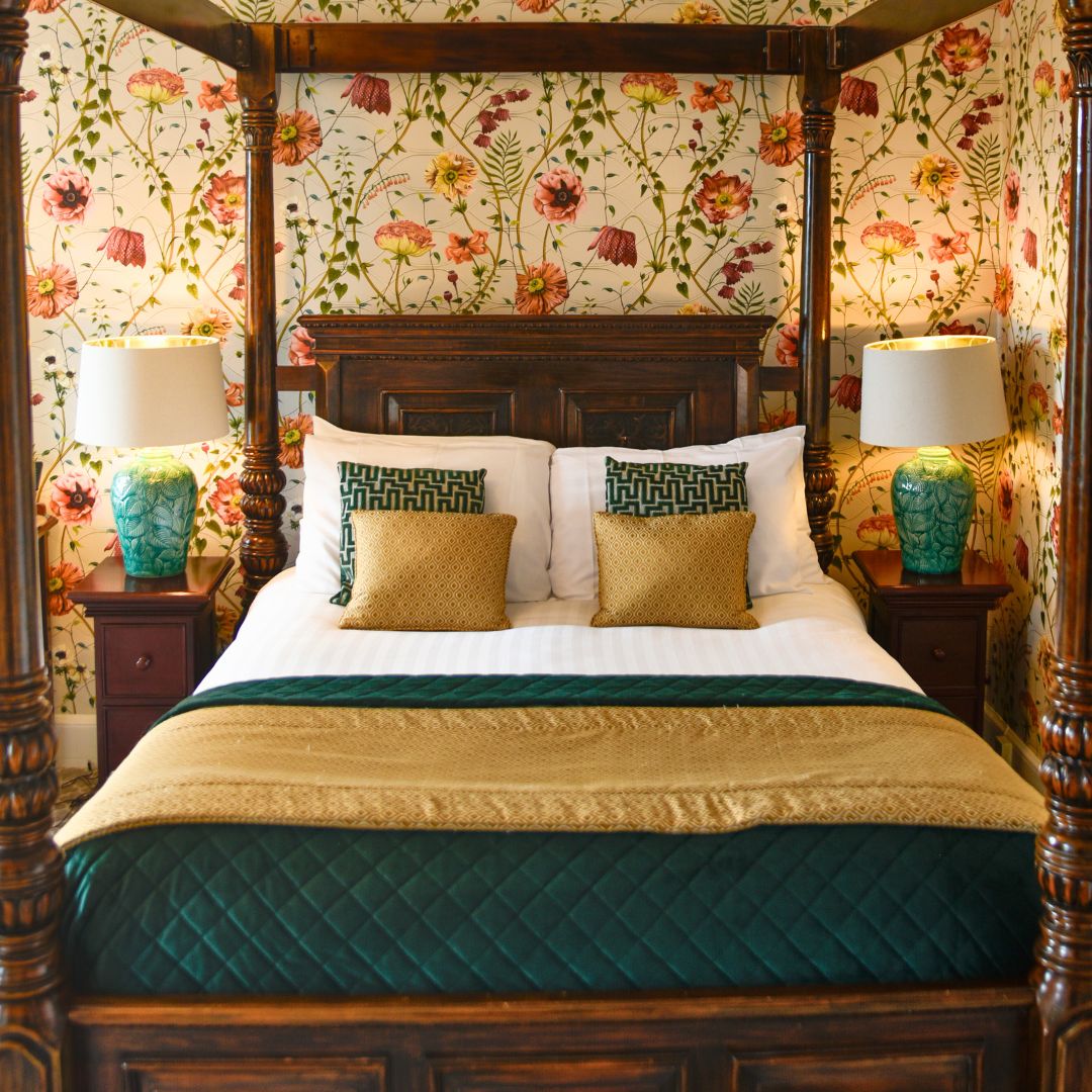 Four Poster Bed Glenesk Hotel, Edzell, luxury wallpaper and table lamps with beautifully dressed bed with velvet covers and cushions