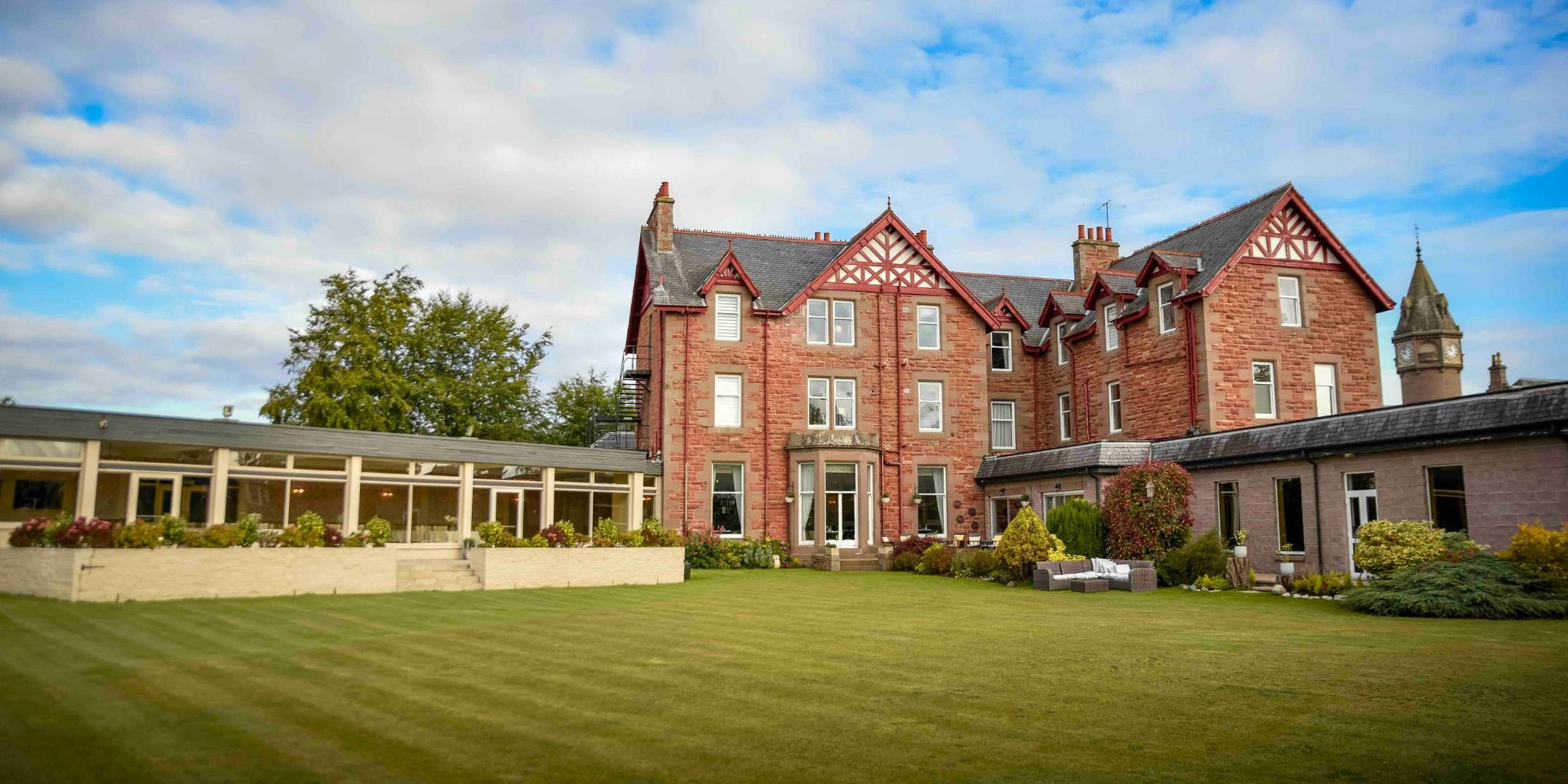 Back Garden shot of Glenesk Hotel and the event function suite extension